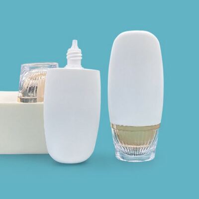 50 ml ovale vorm luxe goud zonnebrandcrème fles - High-End cosmetische plastic fles voor huidverzorging