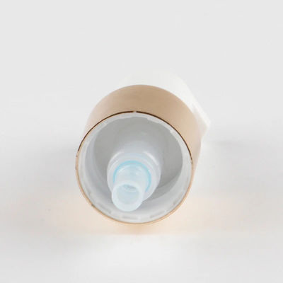 Luxe gouden cosmetische lotionpomp met witte actuator voor huidverzorgingsflessen