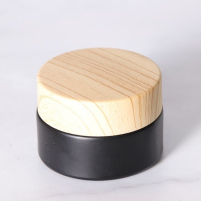 Draagbare 10g crème pot met houten dop voor persoonlijke verzorging Acceptabel klant logo